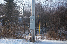 Meter enclosure on power pole